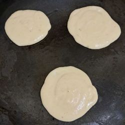American style pancakes - cooking on a hotplate.