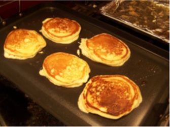 Christmas spiced pancakes cooking.