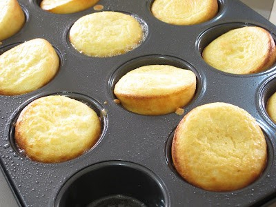 Yorkshire puddings in their oven tins.
